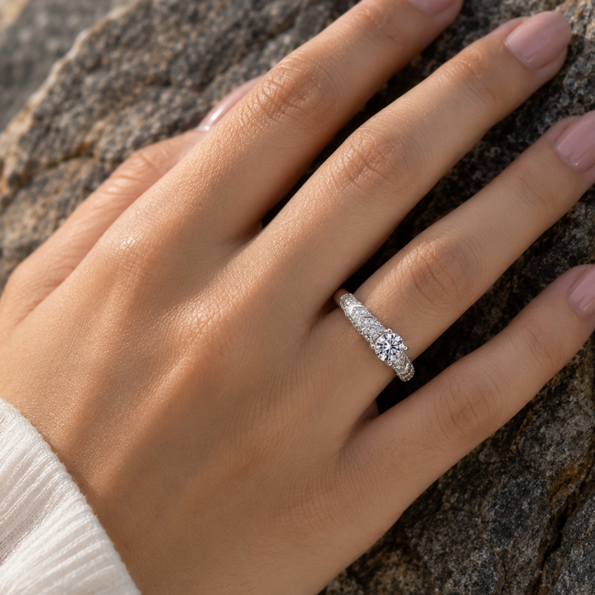 A woman wearing a zircon diamond-cut ring