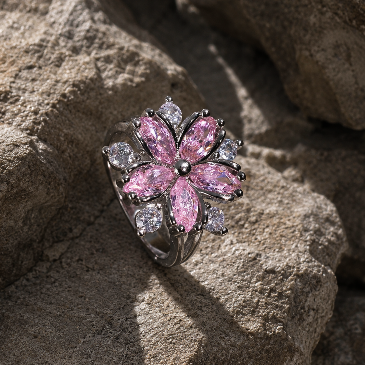 A zircon flower ring on a rock surface