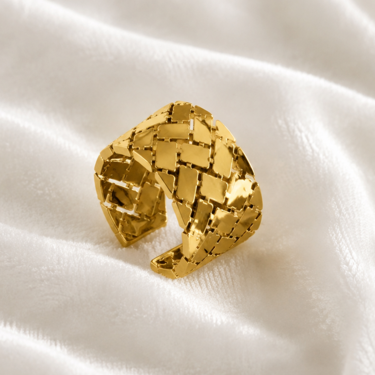 An adjustable cuff ring on a velvet fabric