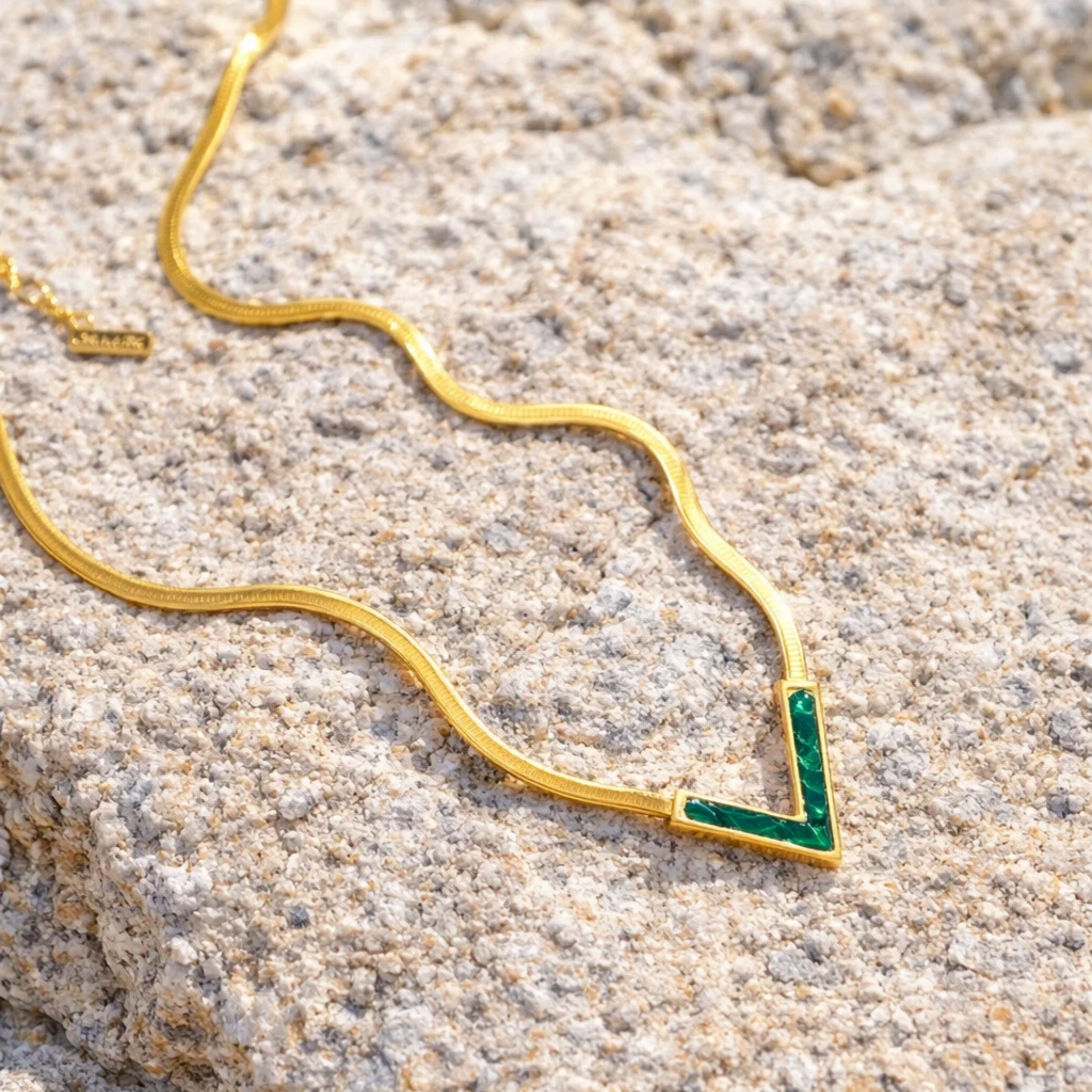 V-shaped green gemstone necklace