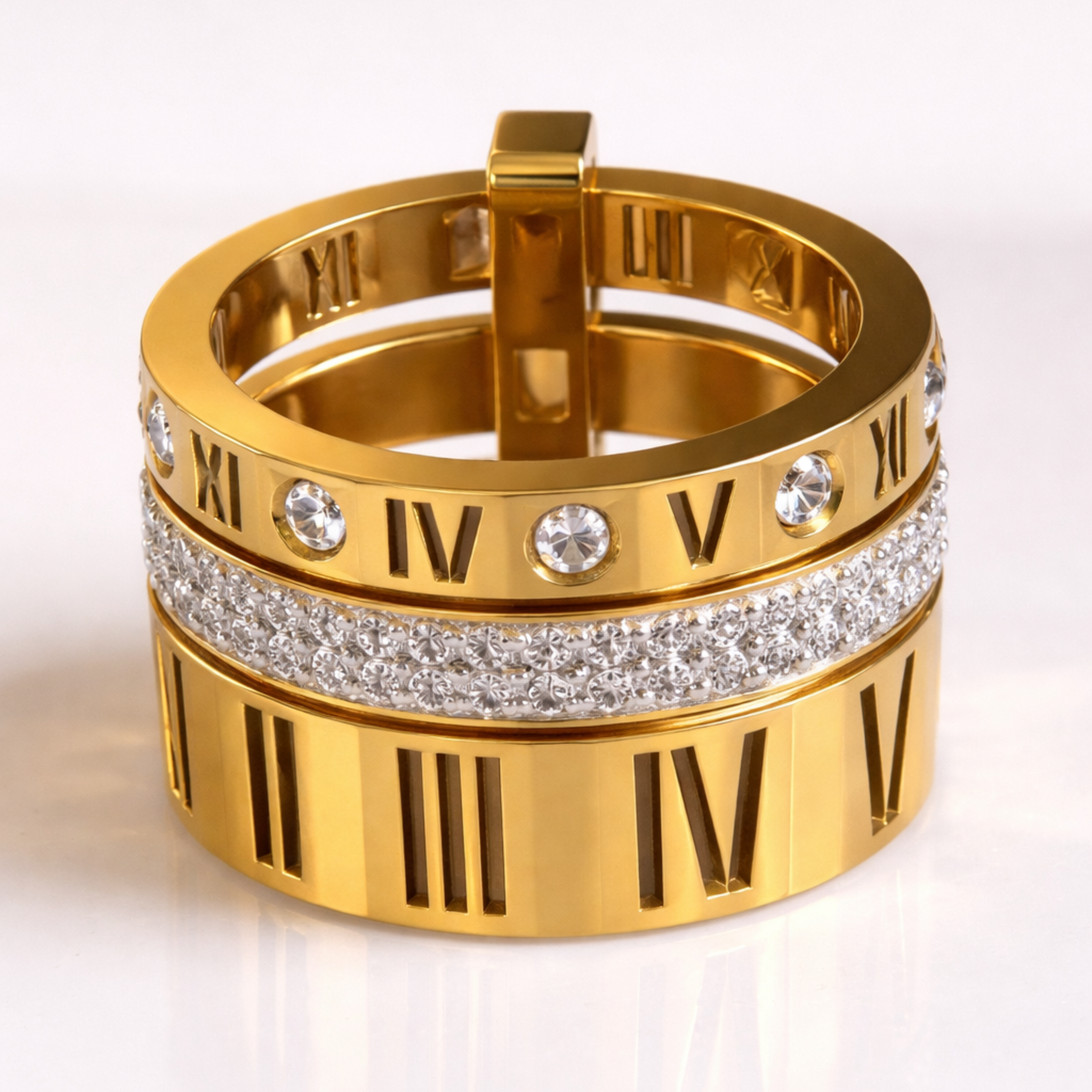 Gold ring with Roman numeral and diamond design on a white background