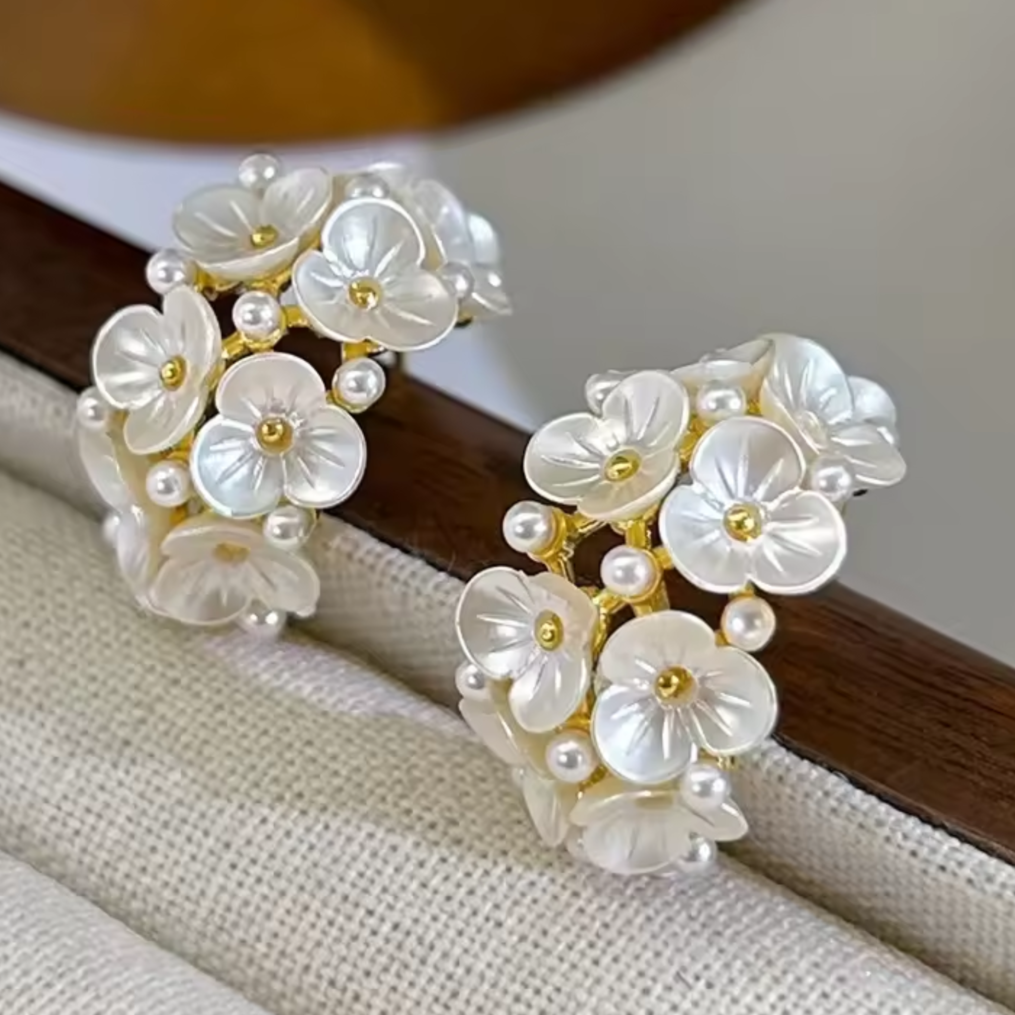 Pair of floral earrings with pearl accents 