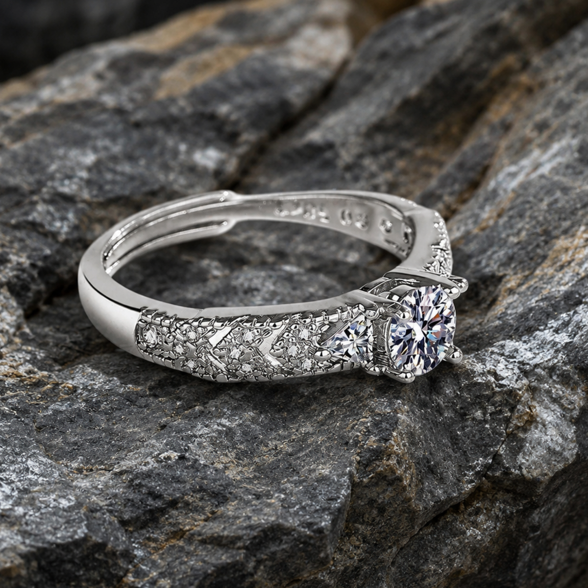 A diamond style ring on a rock surface